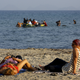 Image for article titled Syrian refugees celebrate a risky journey to Greece with an amazing selfie-stick photo